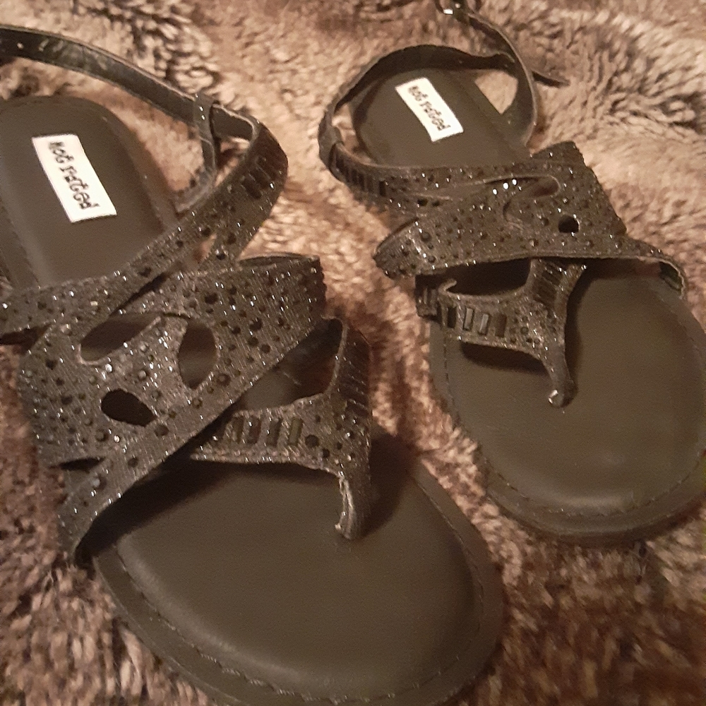 Not rated size 7 black sandals